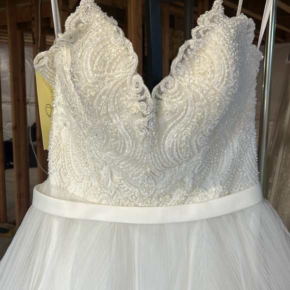 **Allure Bridals: Enchanting Lace and Tulle Gown for Unforgettable Occasions**